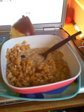 Heaven in a bowl..warm van.soymilk, kashi go lean, pumpkin butta, a few grapes, and a half eaten pear on the side :-]